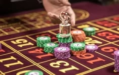 Fullhouse Casino casino presented on mobile device in Pakistan with slots and live games